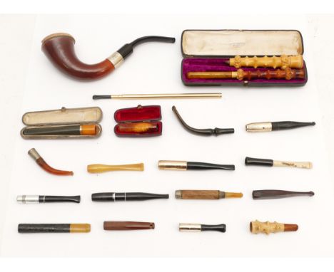 A group of 20th Century smoking related items to include loose and cased cheroot holders together with an Edwardian cased cal