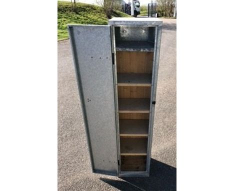 A steel storage unit with internal shelving 30cm (W) x 25cm (D) x 135cm (H), a bank of four pull drawer storage units 54cm (W