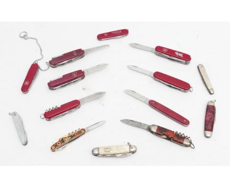 A collection of swiss army style pen knives, together with celluloid and stainless steel handled examples.