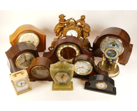 A collection of mid twentieth-century and later mantel, carriage and anniversary clocks, makers to include, Swiza, Enfield, a