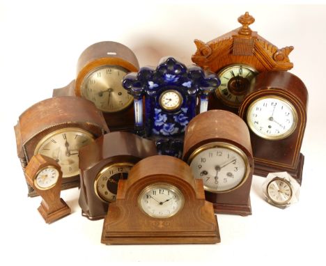 A collection of mid twentieth-century and later mantel, anniversary and desk clocks, makers to include, Waltham, Enfield, and