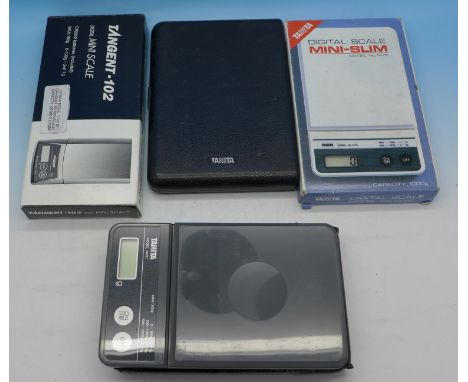 Four sets of jewellery scales