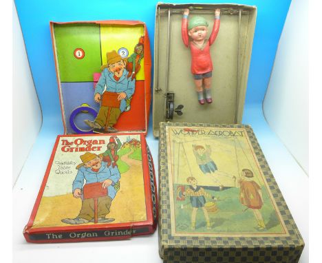 A Japan made early 20th Century Wonder Acrobat toy and a Chad Valley Table Quoits Game, The Organ Grinder