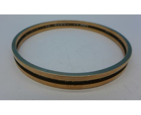 A 9ct gold bangle, 15.6g