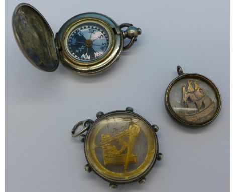 A Masonic fob, one other fob with Victorian hallmark and a compass