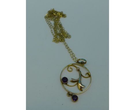 A 9ct gold pendant set with amethysts on a 9ct gold chain, 1.1g