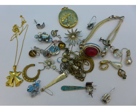 A silver bracelet, a silver gilt pendant and chain, a plated locket a/f and assorted earrings