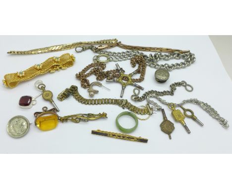 A swivel fob, Albert chain, watch keys, etc.