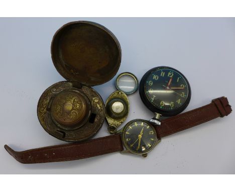 A Smiths car clock, a travelling inkwell, a compass/eye glass and a Buler wristwatch