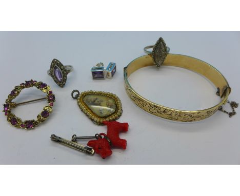 A rolled gold bangle, two silver rings, a silver Scottie dog drop brooch, one other brooch, a pendant and a pair of earrings