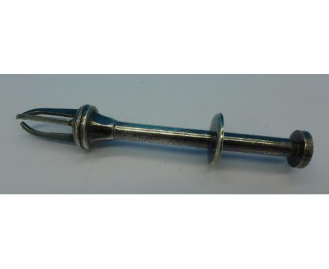 A pair of enamel mounted olive nips