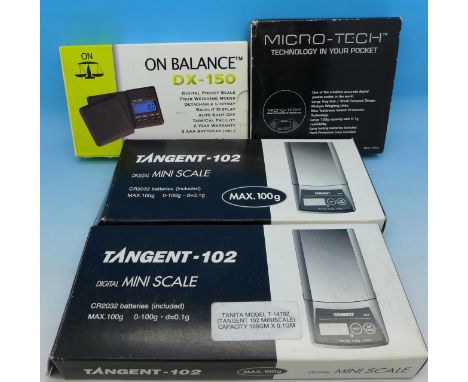 Four sets of jewellery scales