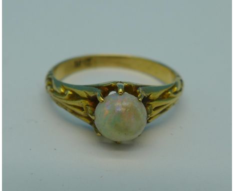 An 18ct gold and opal ring, 3.2g, M