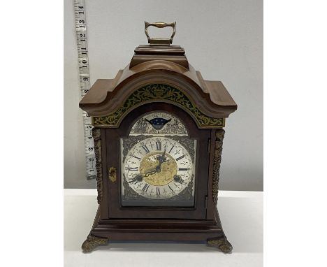 A wooden cased bracket clock made by Wuba (no key), shipping unavailable 
