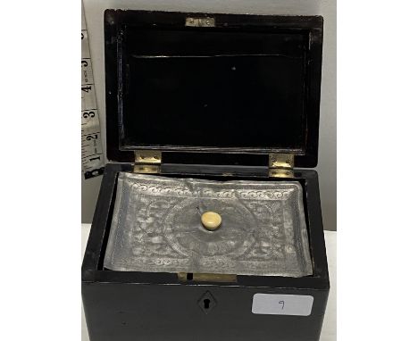 A antique Chinese tea caddy with lead liner and village life decoration to top 