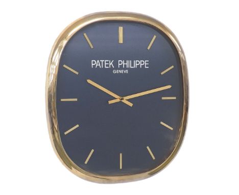 Rare Patek Philippe 'Ellipse d'Or' large gilt metal advertising/ publicity wall clock, blue dial with gilt baton markers and 