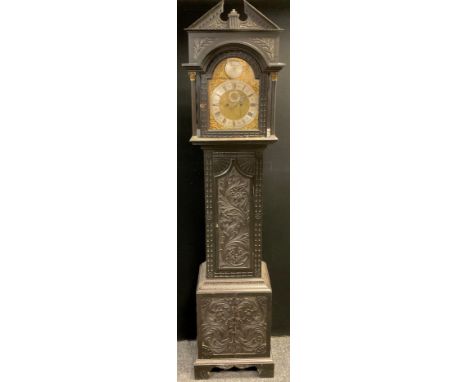 A Victorian carved oak longcase clock case, (later 8-day chiming movement), brass and silvered metal dial, Roman numerals. Th