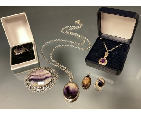 A silver mounted Blue John oval pendant; a Blue John oval brooch; a Blue John ring and pendant; etc (6) 