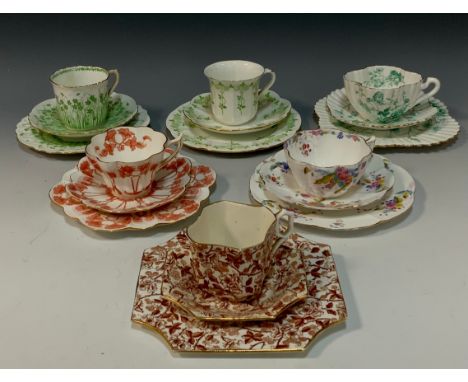 A group of six Wileman and Company tea cup trios including;  a 'Dresden flowers' pattern, no.4243, fairy-shaped tea cup trio,