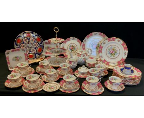 A Royal Albert 'Lady Carlyle' pattern table service including tea pot, sugar bowl, milk jug, twelve tea cups and saucers, cak