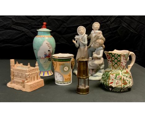 Ceramics- a 20th century vase with cover, 25cm high; a Lladro figure group of children singing, 26cm high; Lilliput lane ‘cha