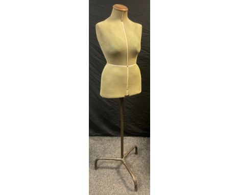 A 1940s Singer Tailors mannequin, female torso in green, telescopic tripod stand,  approx 150cm high 