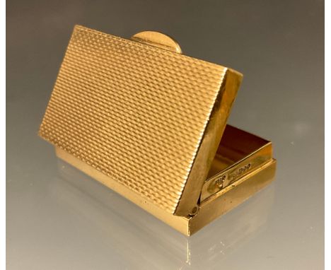 A Garrards 9ct gold pill box, engine turned scale decoration, 3.2cm x 2.2cm, London 1957, 14.4g 