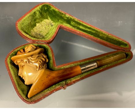A meerschaum pipe, the bowl as a lady wearing a bonnet, 14.4cm long, cased 