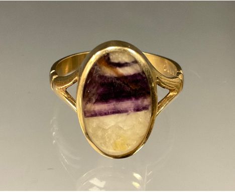 A blue john dress ring, 9ct gold shank, size N 1/2, Sheffield 2006, 4.6g gross. 