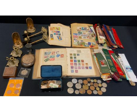 A pair of ornate wall fastened candlesticks; trinket box with fossil species inside; Miners tags; school boy stamp album; lea