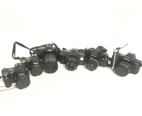 Vintage cameras including Nikon Coolpix 8700, 5700, F50, F3, F-801s, Yashica 230-AF