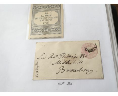 An album containing a quantity of unused British first class pictorial stamps and pictorial Â£1 stamps and an album containin
