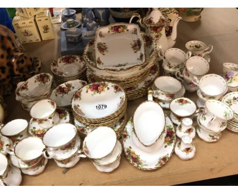 A Royal Albert Old English Country Rose tea coffee and dinner set six place setting including small decorative dishes and Roy