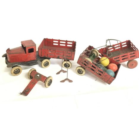 A vintage tin plate toy truck with extras. This lot cannot be posted