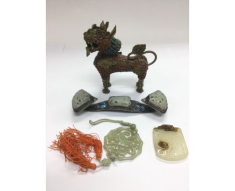 A small collection of jade and enamel items. Shipping category B.