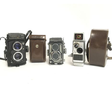 Vintage cameras including a Yashica Mat-124 G, Yashica 44, Bell & Howell Autoset II. This lot cannot be posted