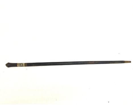 A vintage ebonised Indian sword stick with carved wood and bone decoration. 90cm long. This lot cannot be posted