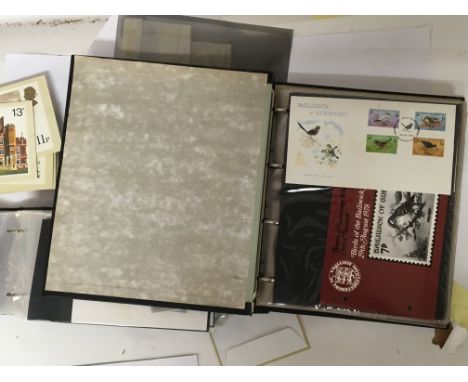 An album containing Guernsey first day covers from the 1978 onwards each with a separate stamp pack one other album of first 