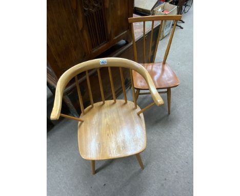 A vintage Centa light beech armchair together with an Ercole beech 391 model dining chair.
