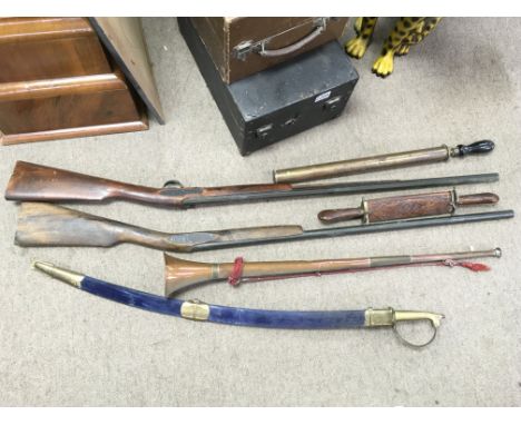 Replica muskets, an Indian curved blade sword, bugle, vintage garden sprayer