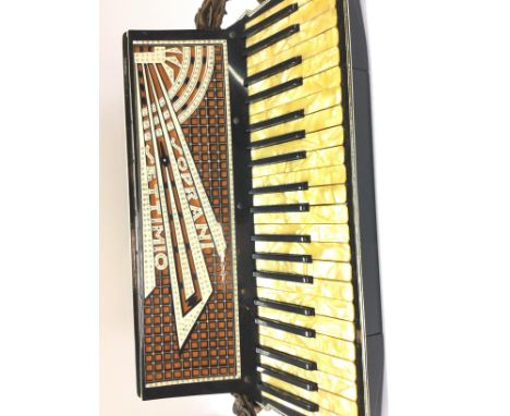 A Cased Italian Cardinal Grand Soprani Setimio Piano Accordion.