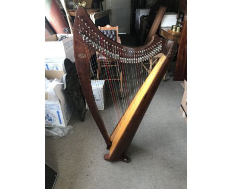 A Contemporary salvo with 34 strings each fitted with semi tone levers, with a pitch range from first octave to c and sixth o
