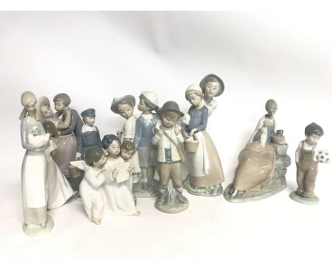 A Collection of Lladro and Nao porcelain figures. This lot cannot be posted