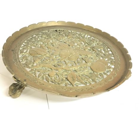 A Bronze tray with dragon feet and fruit design, diameter of 30cm approximately. No reserve Postage category C