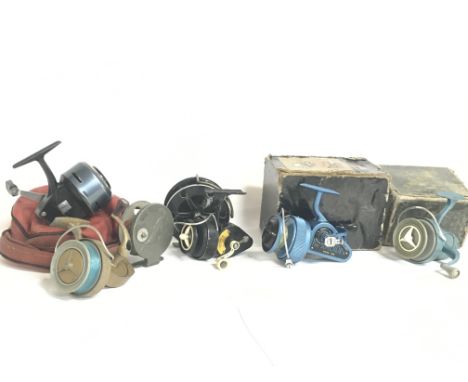 A collection of vintage fly fishing and spinning reels including a boxed J.W Young & Sons The Ambidex Mark six and rods inclu