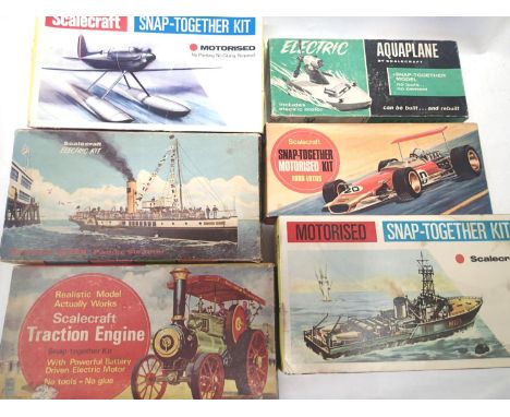 Six scalecraft motorised kits; Lotus, seaplane, aquaplane, traction engine, Medway Green and Minesweeper. Appears complete, c
