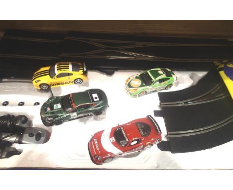 Scalextric digital Super GT set, three cars, track controller etc. and an extra unboxed car. P&amp;P Group 2 (£18+VAT for the
