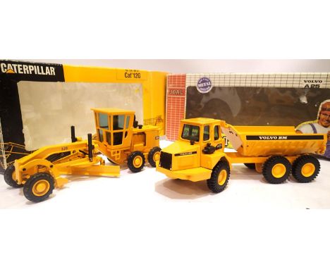 Two Joal 1:50 scale plant CAT 12g grader and articulated dumper, both in good - very good condition, boxes fair. P&amp;P Grou
