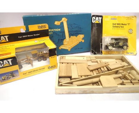 Norscot 1:87 scale grader and an ERTL 1:43 model T Holt delivery van and a wooden construction kit, all in good condition, bo