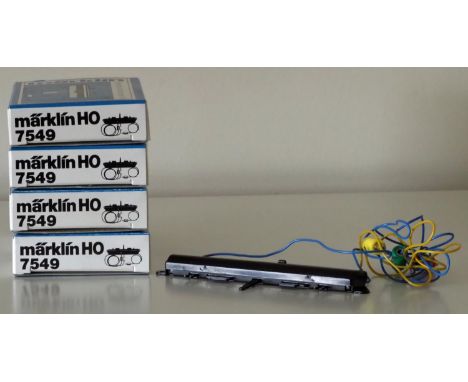 Marklin H0 4 x 7549 electric point motors, for Marklin K-track.  Used but excellent condition, in original boxes with instruc